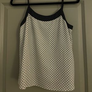 Adorable white with black polka dot top with adjustable straps
